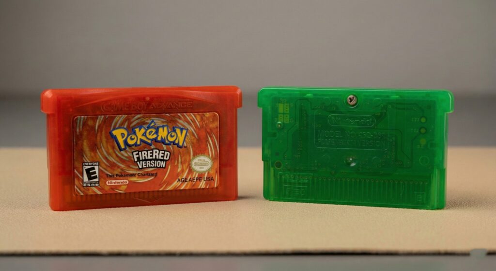Pokémon FireRed and LeafGreen GBA cartridges side by side showing the classic starter Pokémon artwork